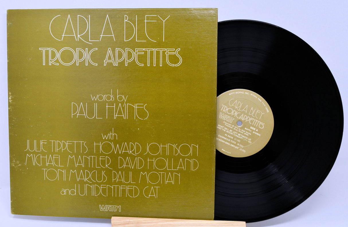 Front cover and record of Carla Bley 'Tropic Appetites' LP in gold sleeve, WATT/1 label
