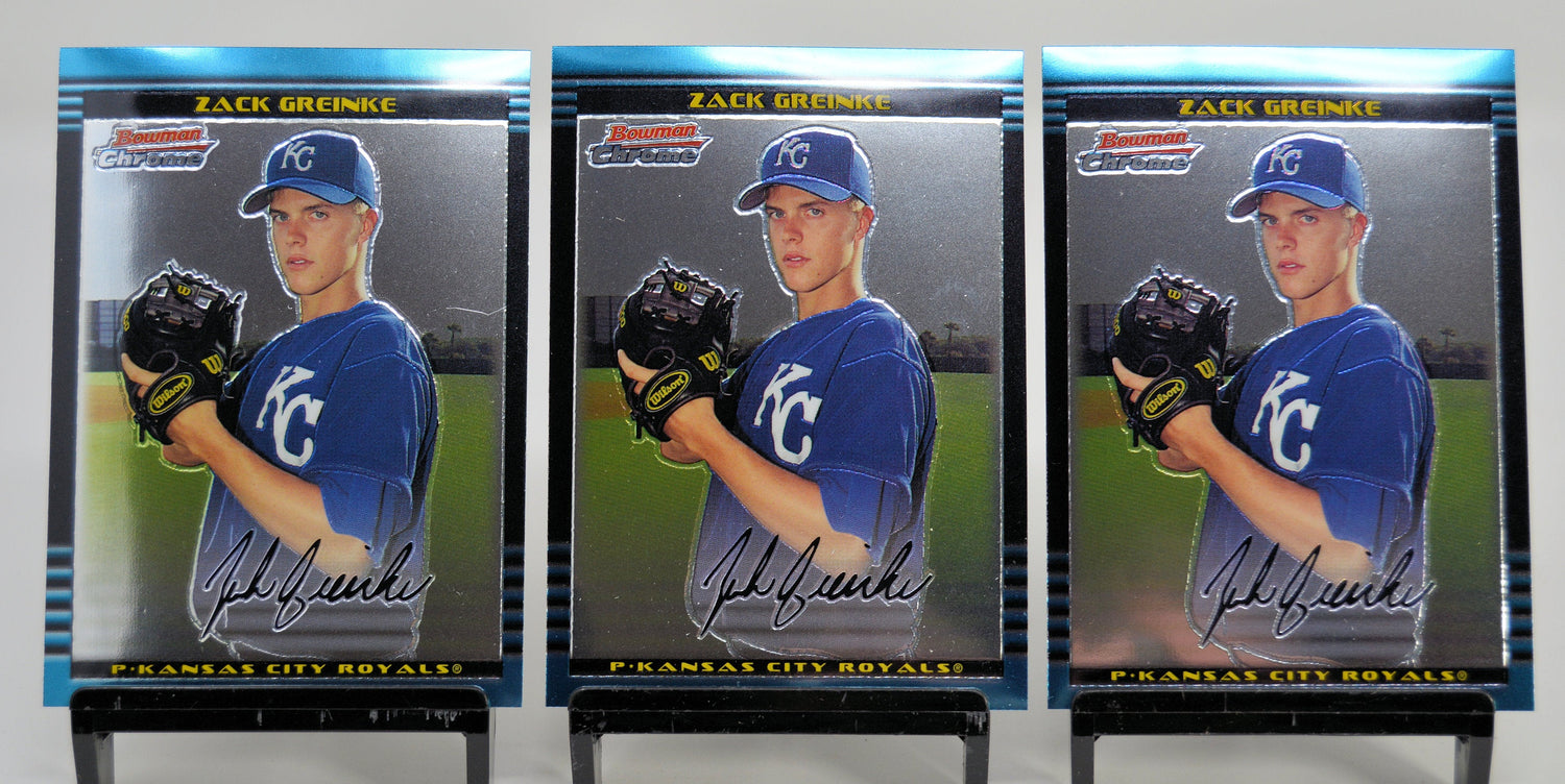 Front view of three 2002 Bowman Chrome Zack Greinke rookie cards featuring player in Royals uniform