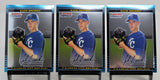 Front view of three 2002 Bowman Chrome Zack Greinke rookie cards featuring player in Royals uniform
