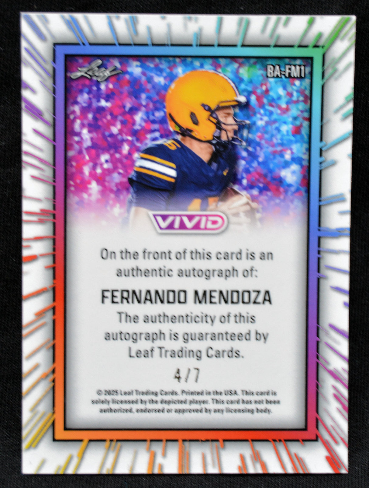 Trading card of Fernando Mendoza with colorful border and Vivid branding numbered 4/7.