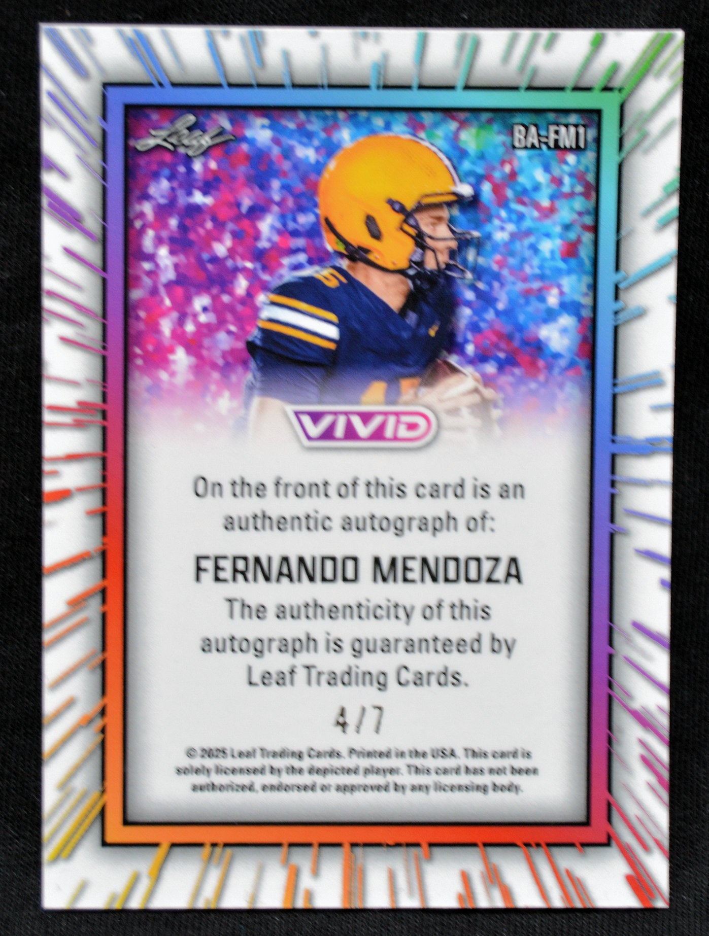 Trading card of Fernando Mendoza with colorful border and Vivid branding numbered 4/7.