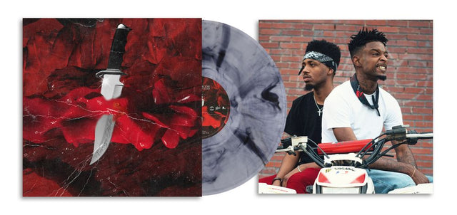 A vinyl record album shown with its sleeve and inner gatefold cover. The sleeve features a dark red abstract background with a knife graphic, and the gatefold shows two men sitting on a red ATV in front of a brick wall.