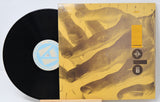 Used vinyl record of 23 Skidoo with a yellow and black cover featuring a hand graphic design.