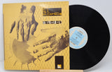 Used vinyl record of 23 Skidoo with a yellow and black cover featuring a hand graphic design.