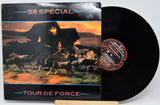 Vinyl record album '38 Special - Tour de Force' with the black LP partially pulled from the sleeve, showing the album art and center label.