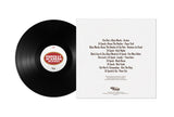 Vinyl record with a label and tracklist on a white background