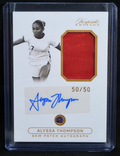 Front of Alyssa Thompson Gem Patch Autograph card with red relic, signature, and 50/50 serial number