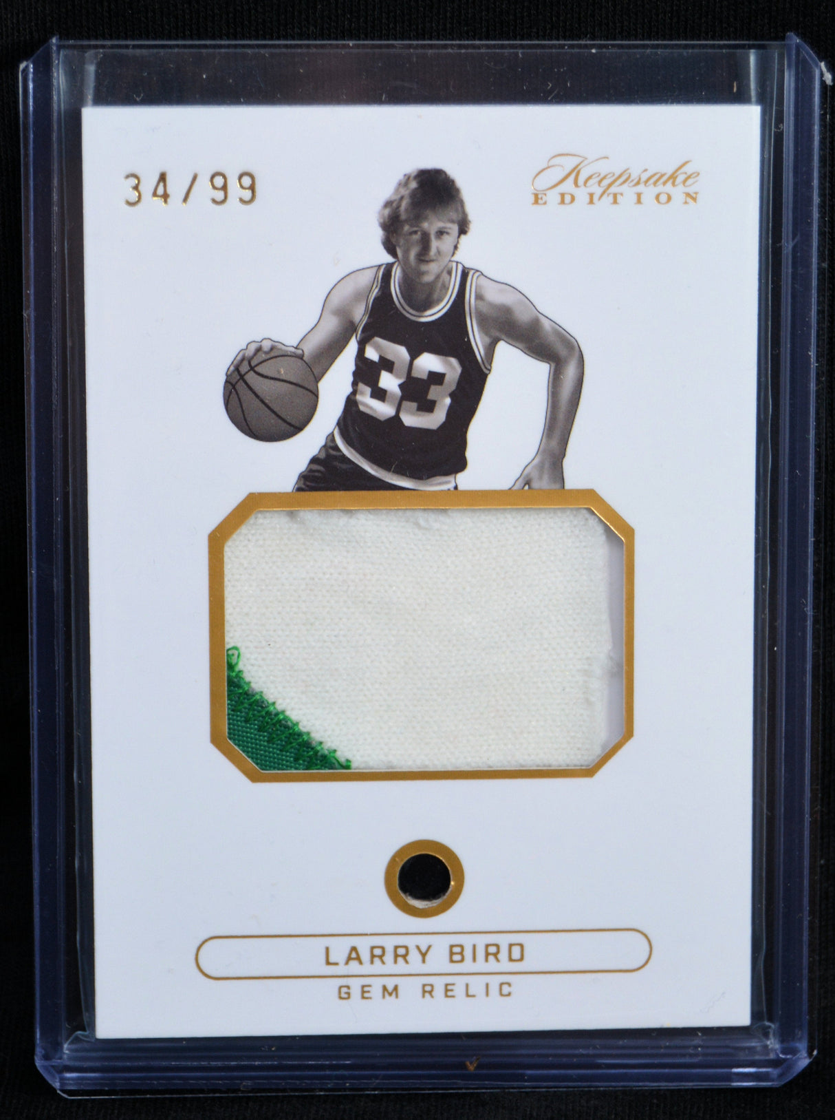 Front of Larry Bird Gem Relic Keepsake Edition card numbered 34/99 with memorabilia patch