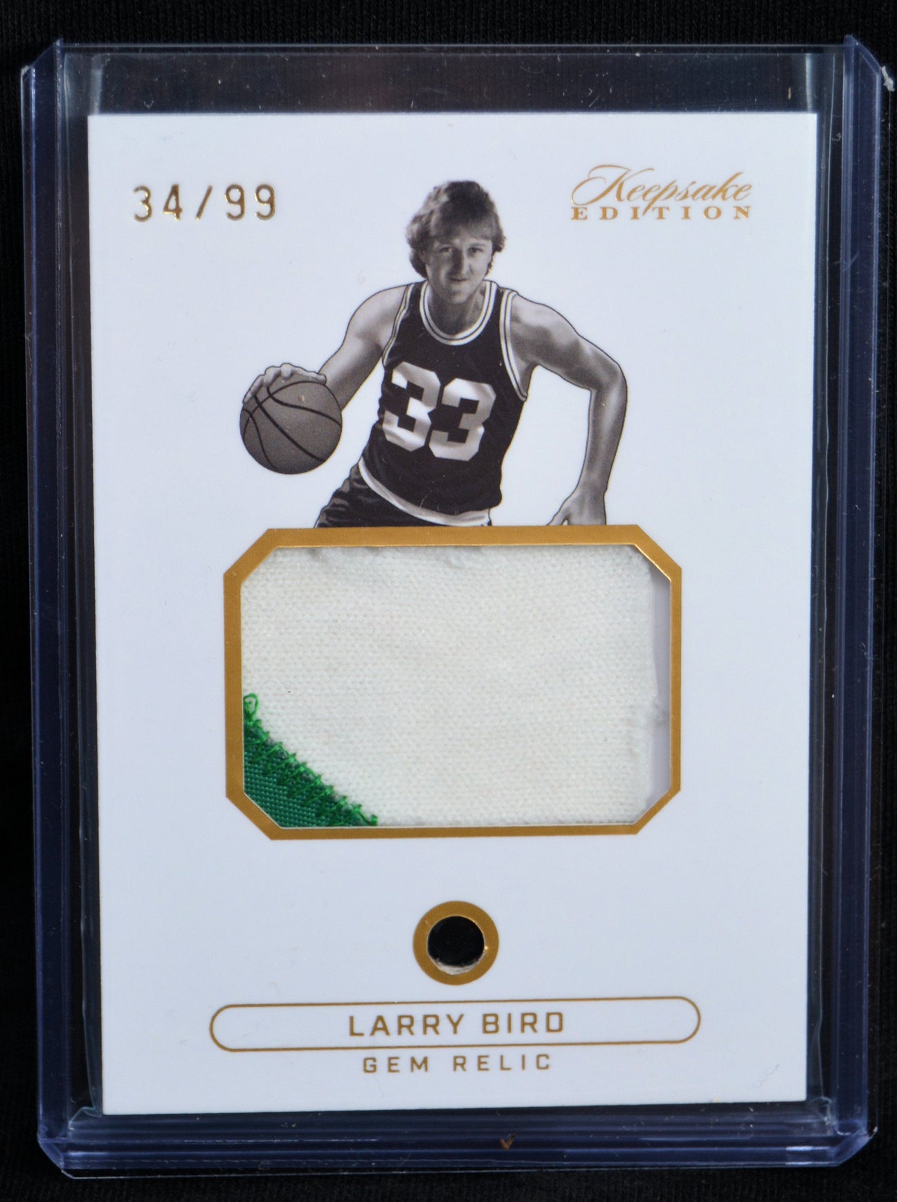 Front of Larry Bird Gem Relic Keepsake Edition card numbered 34/99 with memorabilia patch
