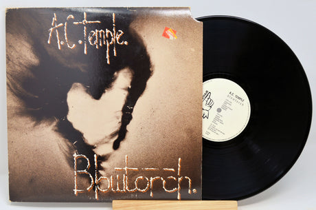 Used vinyl record of A.C. Temple - Blowtorch with record label visible.