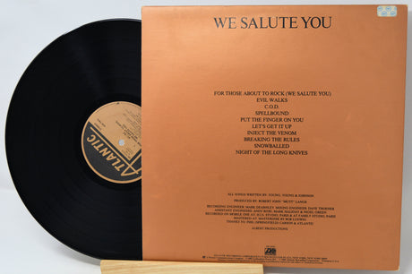 Vinyl record with brown cover displaying text and a logo.