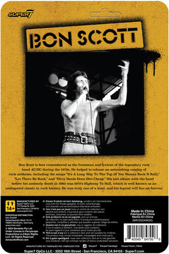 Bon Scott ReAction Figure in packaging, featuring the AC/DC frontman in a leopard print vest and jeans, holding a microphone.