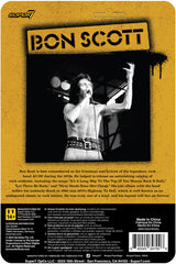 Bon Scott ReAction Figure in packaging, featuring the AC/DC frontman in a leopard print vest and jeans, holding a microphone.