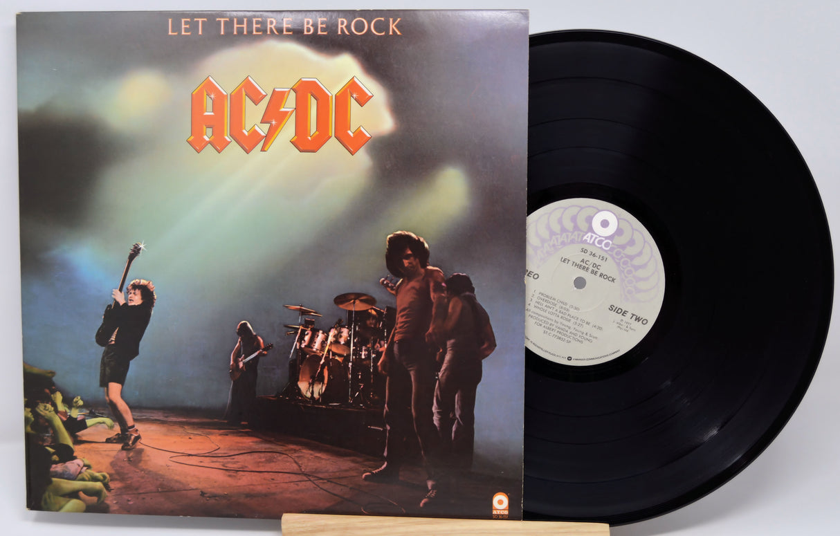 Vinyl record and cover of AC/DC's 'Let There Be Rock' album.