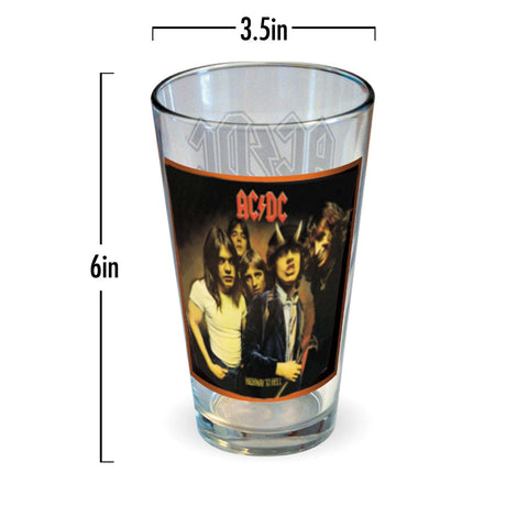 A set of four AC/DC branded 16 oz pint glasses, each with a different album image from the band's popular releases, presented in an official licensed product box.