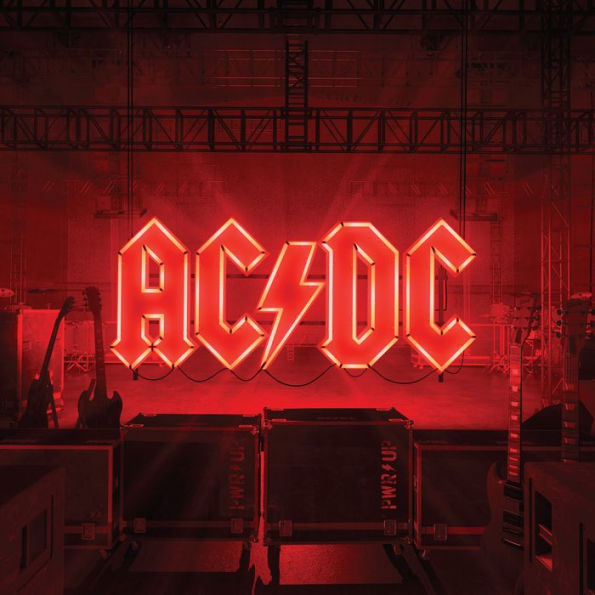 Neon AC/DC logo on a red background with musical equipment.