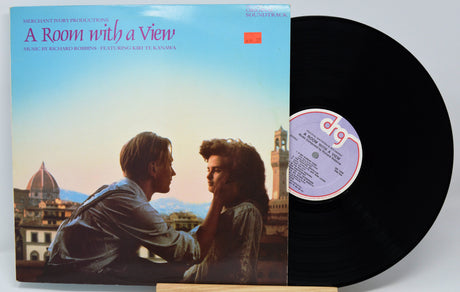 Vinyl record with cover featuring two people and a scenic background
