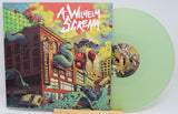 Front cover of 'Lose Your Delusion' vinyl by A Wilhelm Scream featuring a city scene with tentacles and destruction