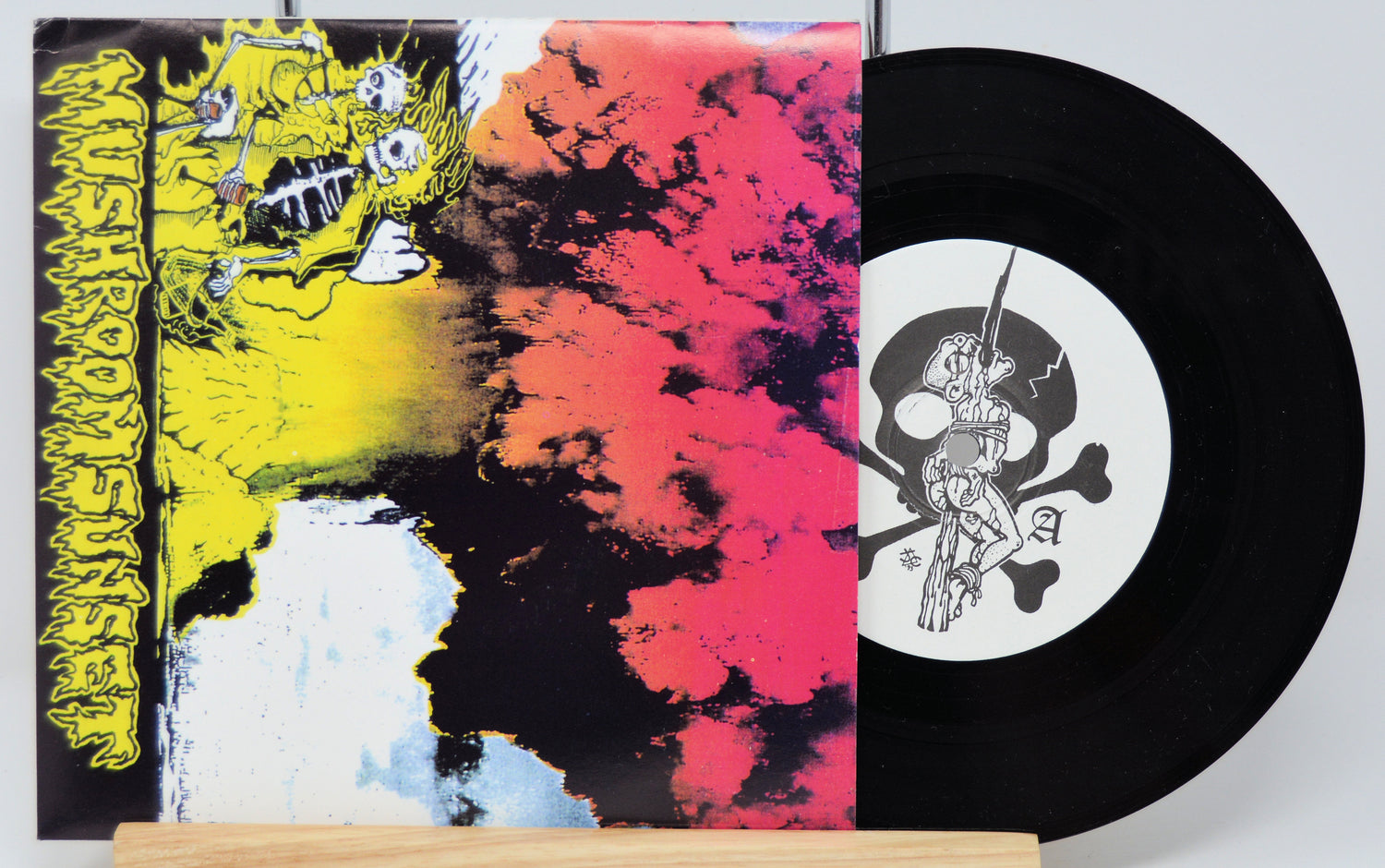 Used vinyl record of The Aborted - Mushroom Sunset with a colorful abstract design on the cover.