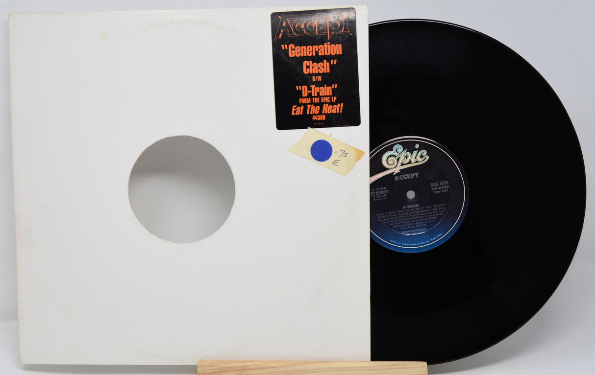 Vinyl record with white cover and 'Epic' label on a white background