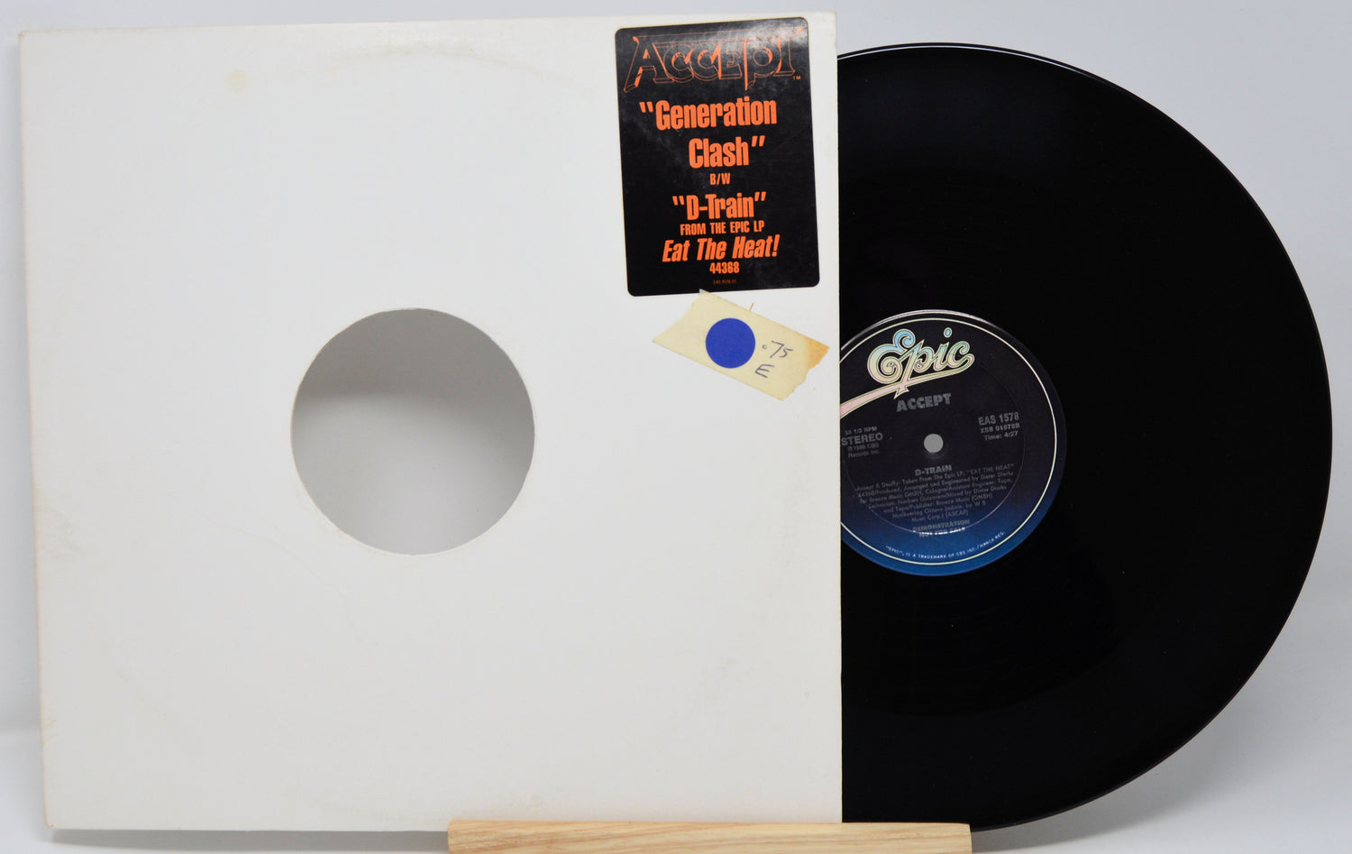 Vinyl record with white cover and 'Epic' label on a white background