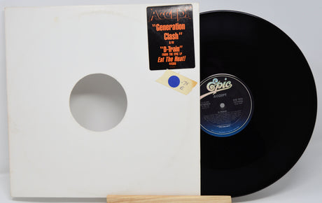Vinyl record with white cover and 'Epic' label on a white background
