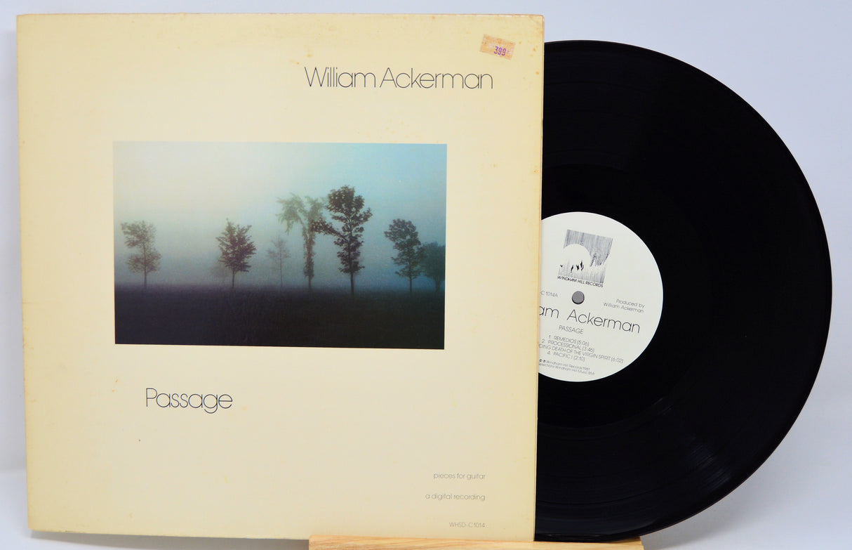 Vinyl record and cover with 'William Ackerman Passage' on a light blue background