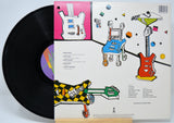 Vinyl record 'Vinyl Record and Back Cover' with a colorful album cover featuring illustrations of guitars.
