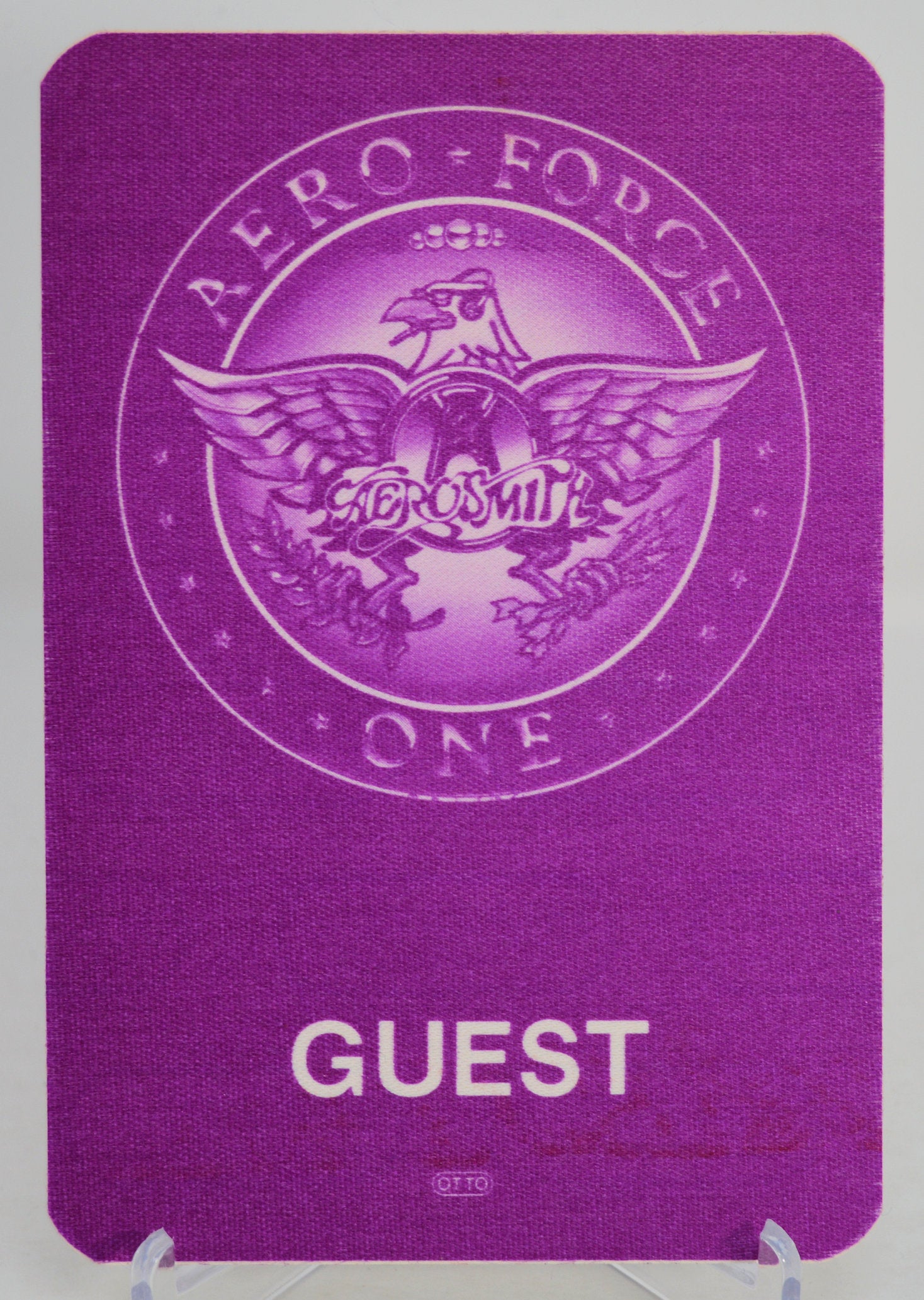 Aerosmith purple 'Aero Force One' guest pass with eagle emblem on a white background