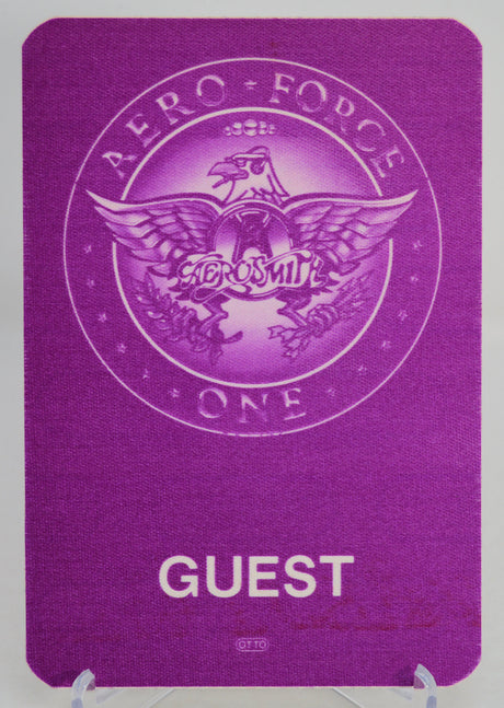 Aerosmith purple 'Aero Force One' guest pass with eagle emblem on a white background