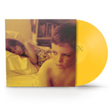 Vinyl record with a yellow cover featuring a child and a dog, on a white background.