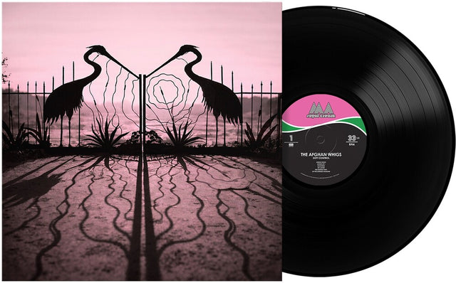 Vinyl record with a pink and black cover featuring a silhouette of two birds.