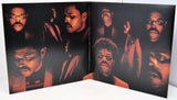 After Hours vinyl gatefold with multiple The Weeknd portraits in dramatic red lighting