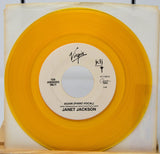 Janet Jackson Again yellow vinyl record jukebox single with piano vocal side displayed