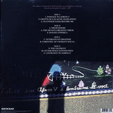 Album back cover with tracklist and artistic design on a dark background