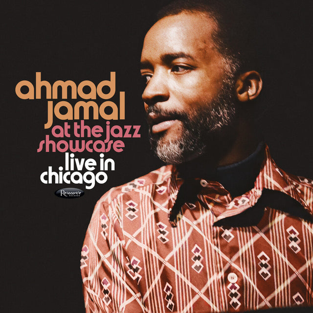 Album cover featuring a man with text 'ahmad jamal at the jazz showcase live in chicago' on a dark background.