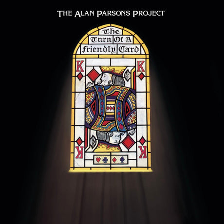 Album cover art for 'The Turn of a Friendly Card' by The Alan Parsons Project, featuring a stained-glass-style illustration of a playing card design centered on a black background with dramatic light beams.
