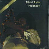 Cover of Albert Ayler's Prophecy album featuring Ayler playing saxophone on stage