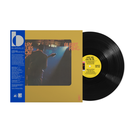 Vinyl record and cover with a person playing guitar on a stage, featuring Bluesville branding.