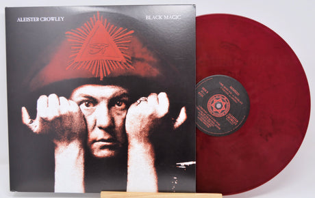 Aleister Crowley Black Magic LP cover with intense portrait and red marbled vinyl