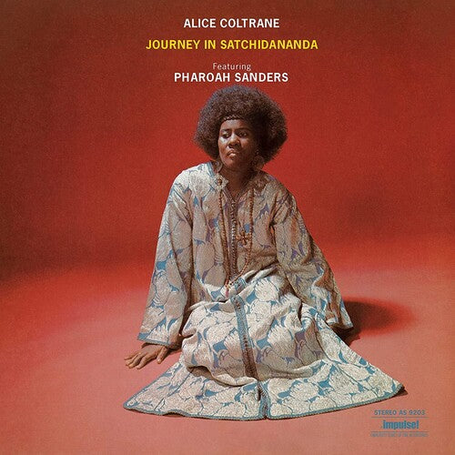 Album cover featuring Alice Coltrane sitting on a red background with text about the album 'Journey in Satchidananda'.