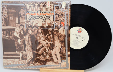 Vinyl record with cover featuring a group of people and 'Alice Cooper's Greatest Hits' text.