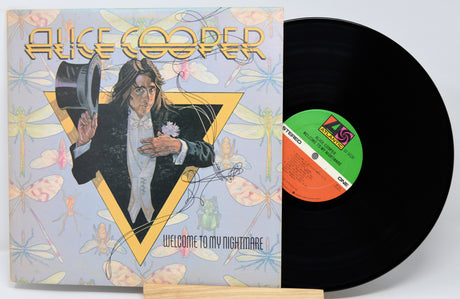 Vinyl record with cover featuring Alice Cooper's 'Welcome to My Nightmare' on a white background
