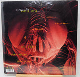 Vinyl record cover with red and black design and text