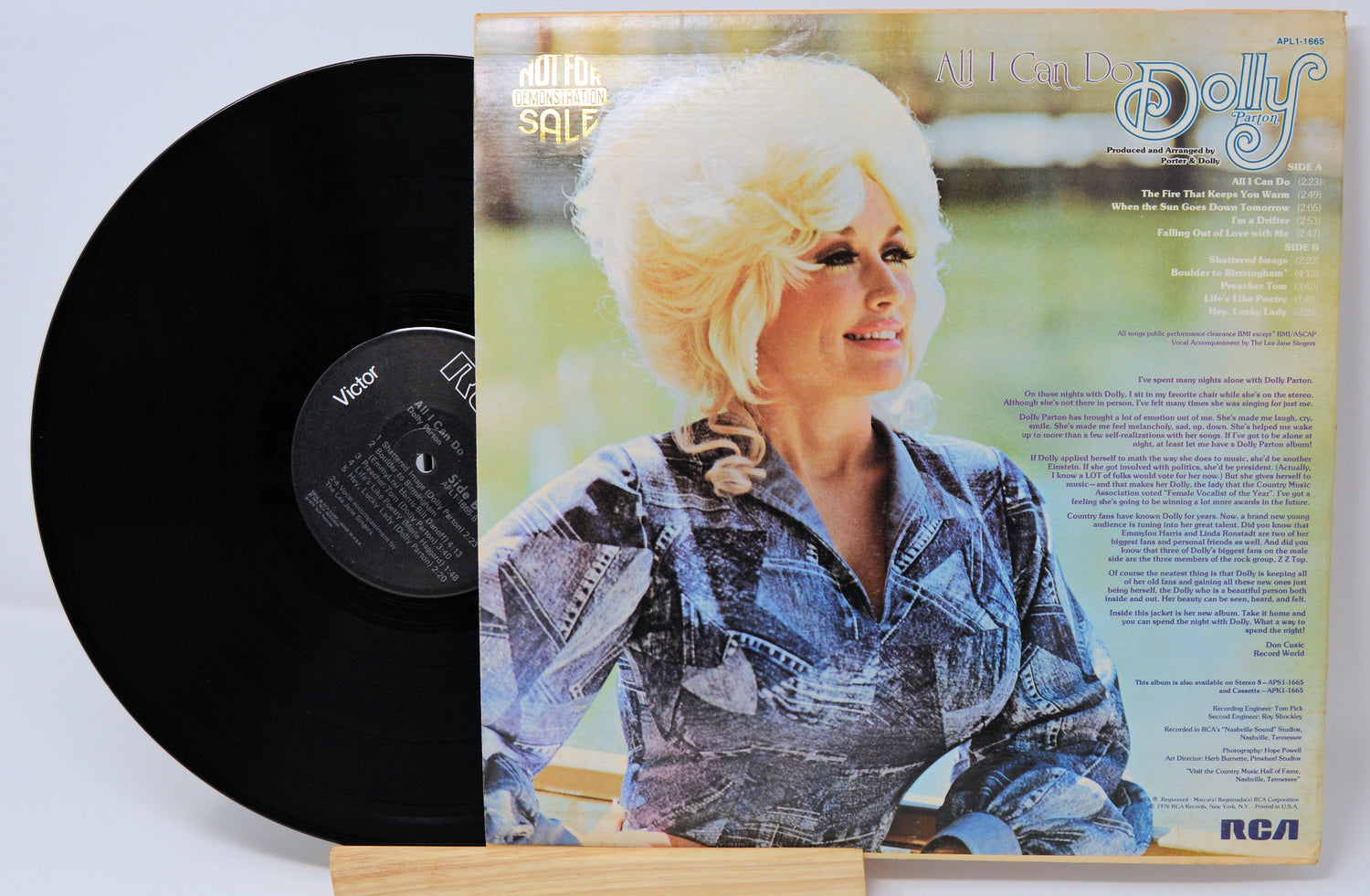 Back cover of Dolly Parton's All I Can Do vinyl LP featuring artist portrait and track listing