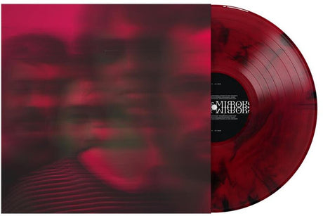 Red vinyl record with a blurred design on the cover