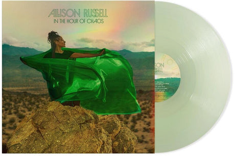 Vinyl record with a person in a green dress on a desert landscape and rainbow, labeled 'Allison Russell In the Hour of Chaos'.