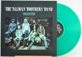The Allman Brothers Band 'Collected' vinyl record album with a black cover and a translucent mint green record partially visible behind it.