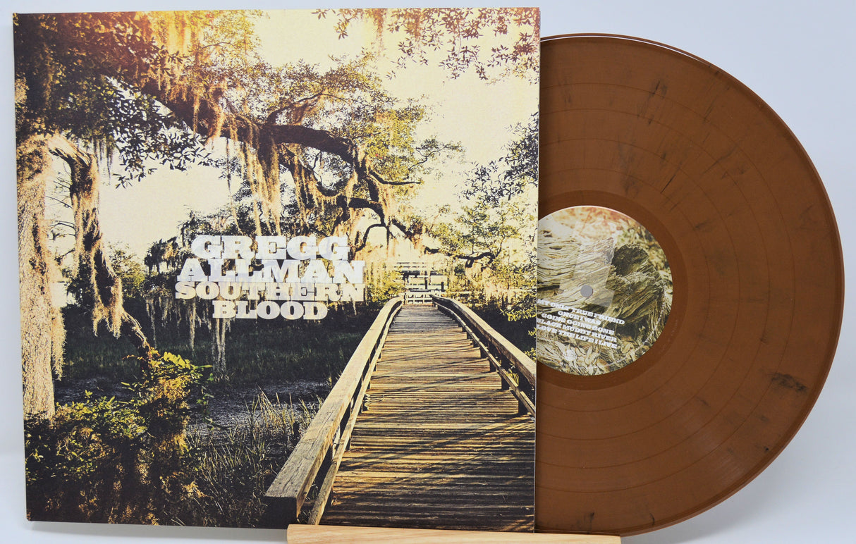 Vinyl record with cover featuring a wooden bridge and trees, labeled 'Southern Blood'.