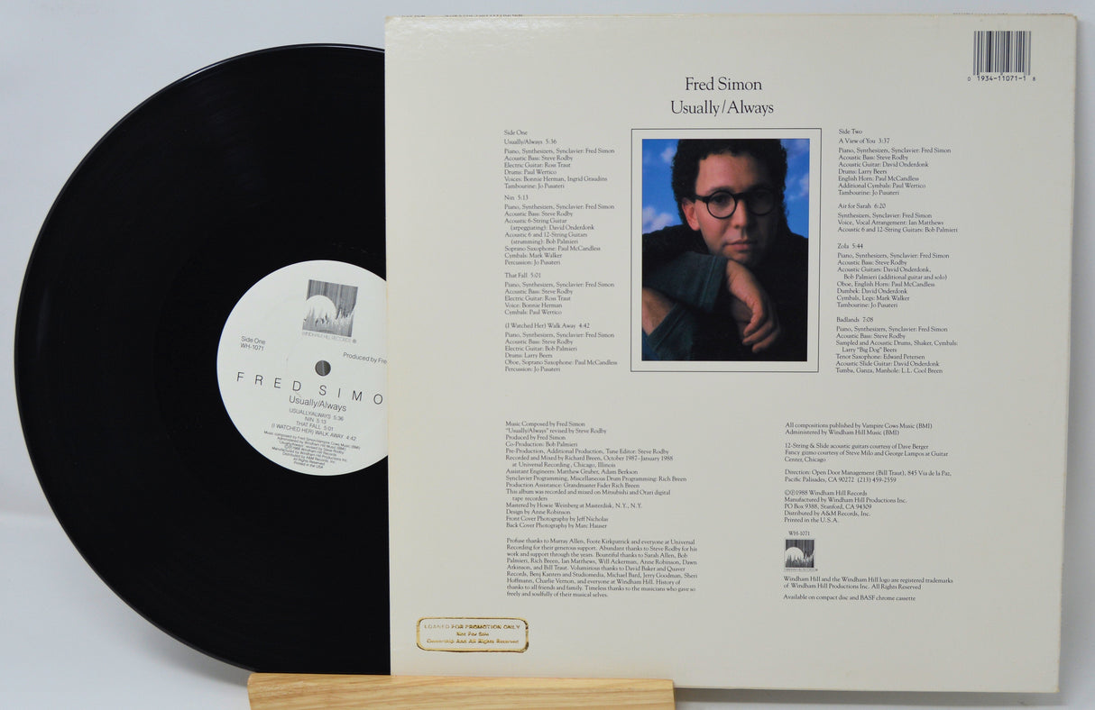 Fred Simon Usually/Always vinyl record and back cover showing track list and artist portrait